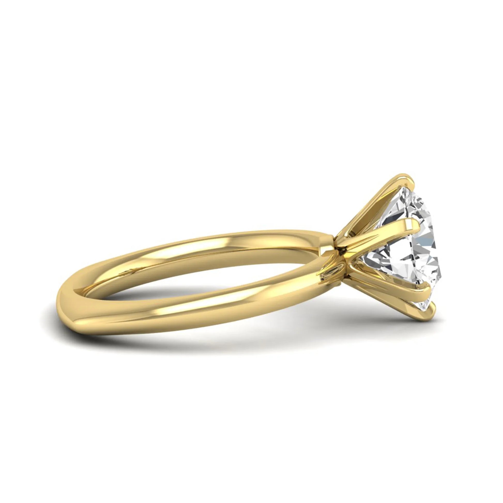 IGI certified round cut lab grown diamond solitaire engagement ring in yellow gold with a classic six-prong setting.