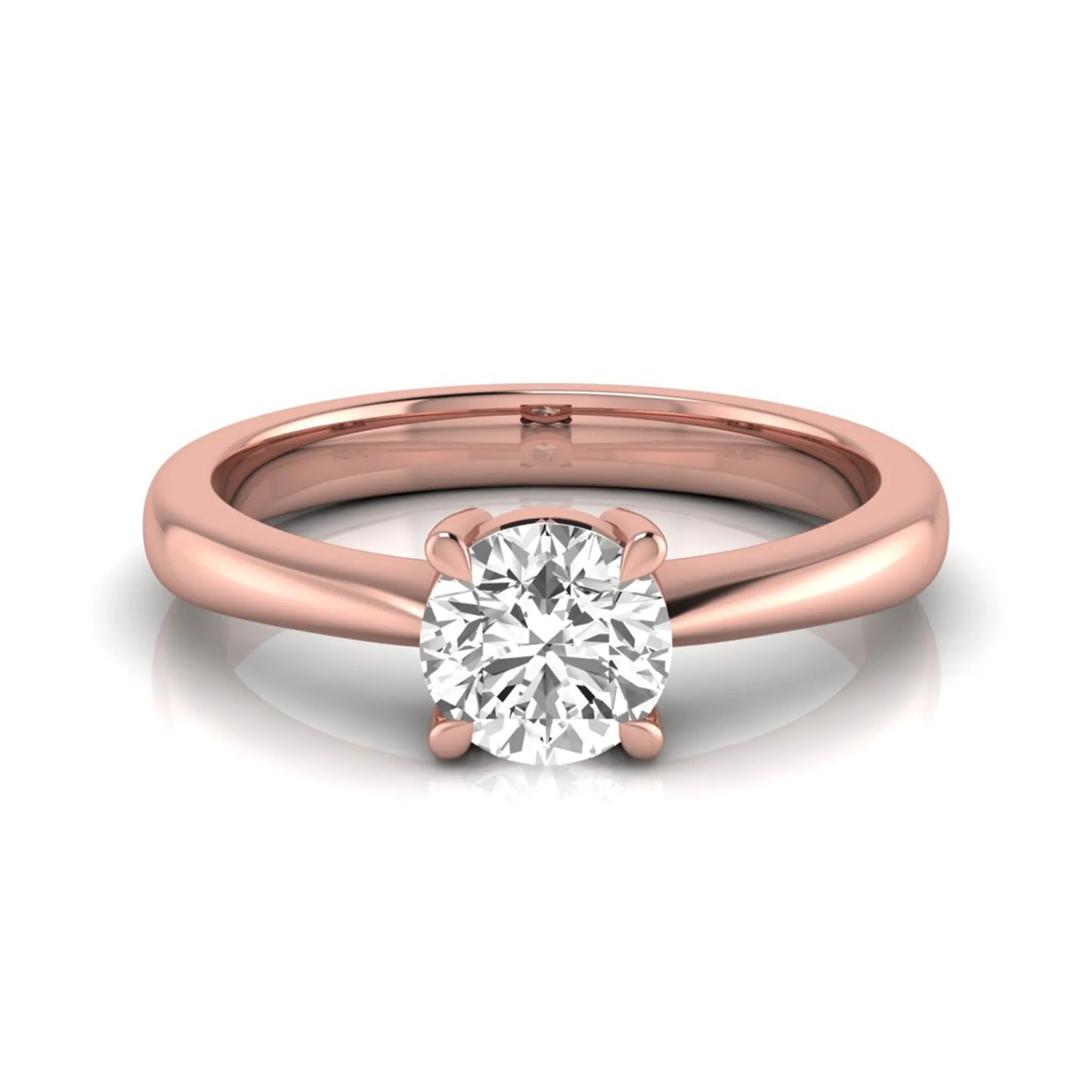 Round cut lab grown diamond solitaire engagement ring in rose gold with classic four-prong setting.