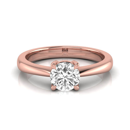Round cut lab grown diamond solitaire engagement ring in rose gold with classic four-prong setting.