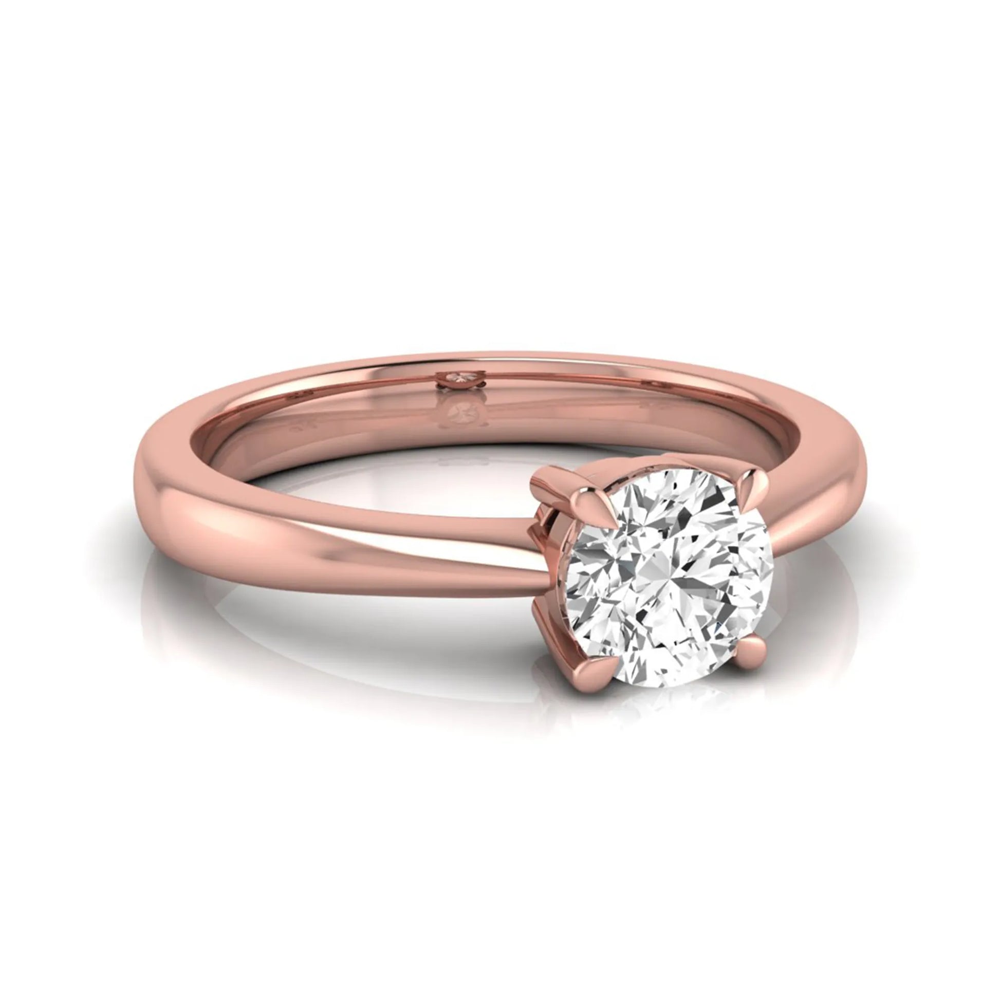Round cut lab grown diamond solitaire engagement ring in rose gold with classic four-prong setting.