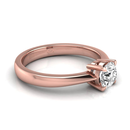 Round cut lab grown diamond solitaire engagement ring in rose gold with classic four-prong setting.