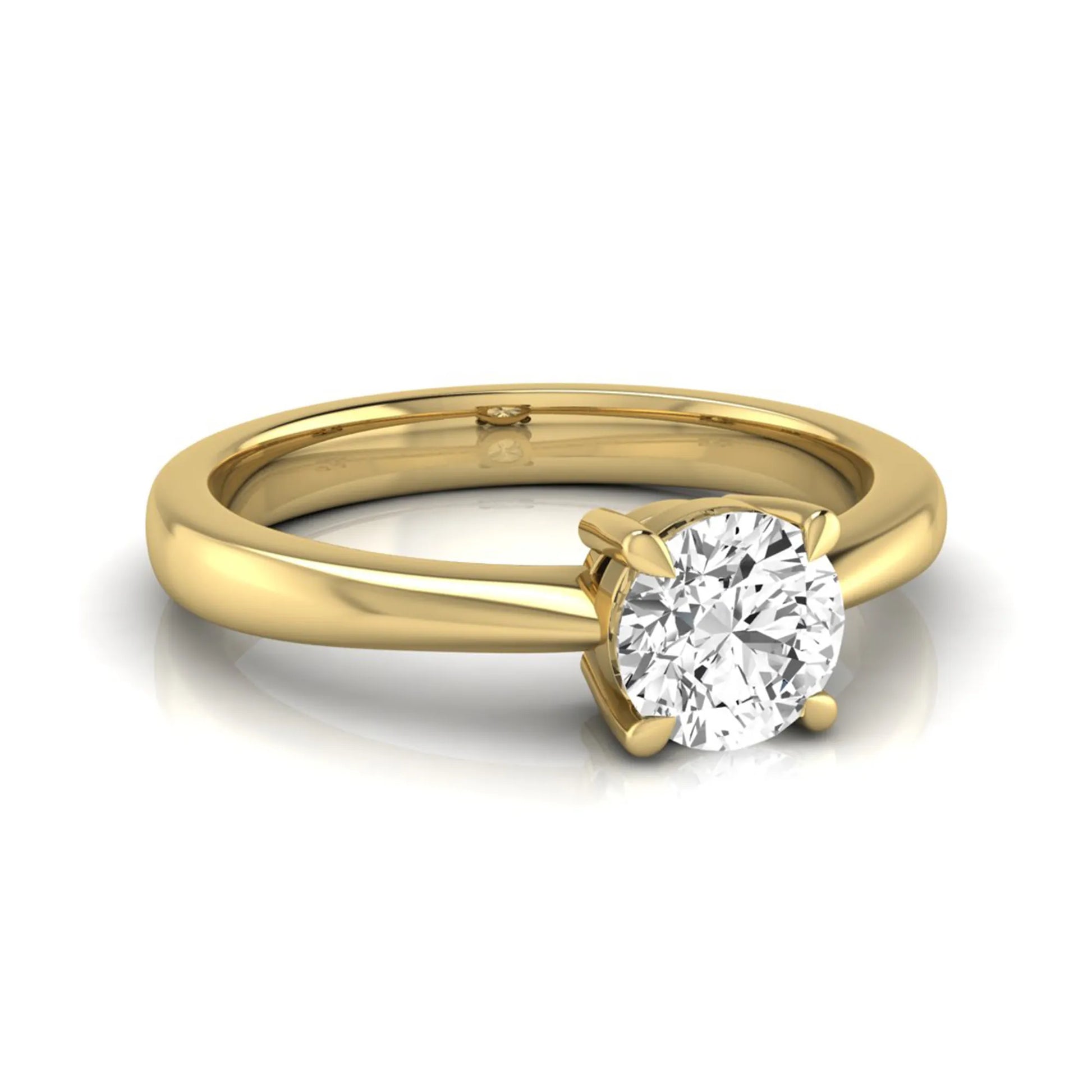 Round cut lab grown diamond solitaire engagement ring in yellow gold with classic four-prong setting.