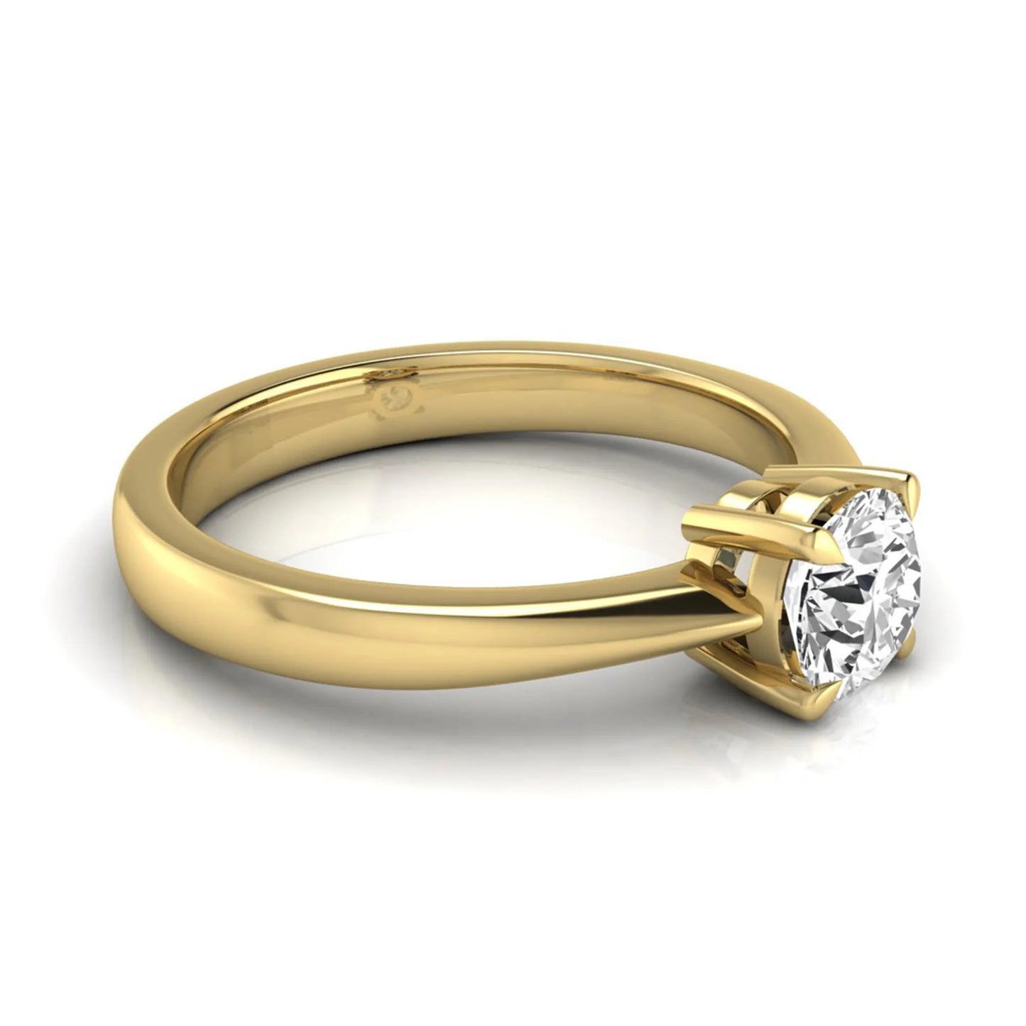 Round cut lab grown diamond solitaire engagement ring in yellow gold with classic four-prong setting.