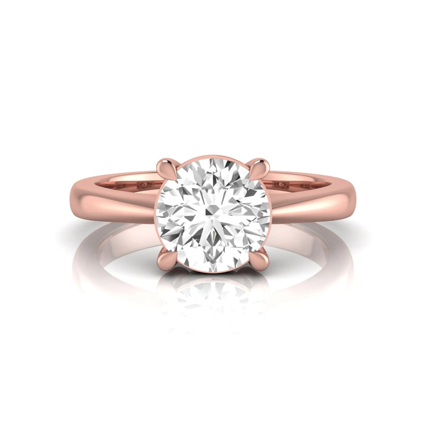 Round cut lab grown diamond solitaire engagement ring in rose gold featuring a 1.28 carat IGI certified diamond.