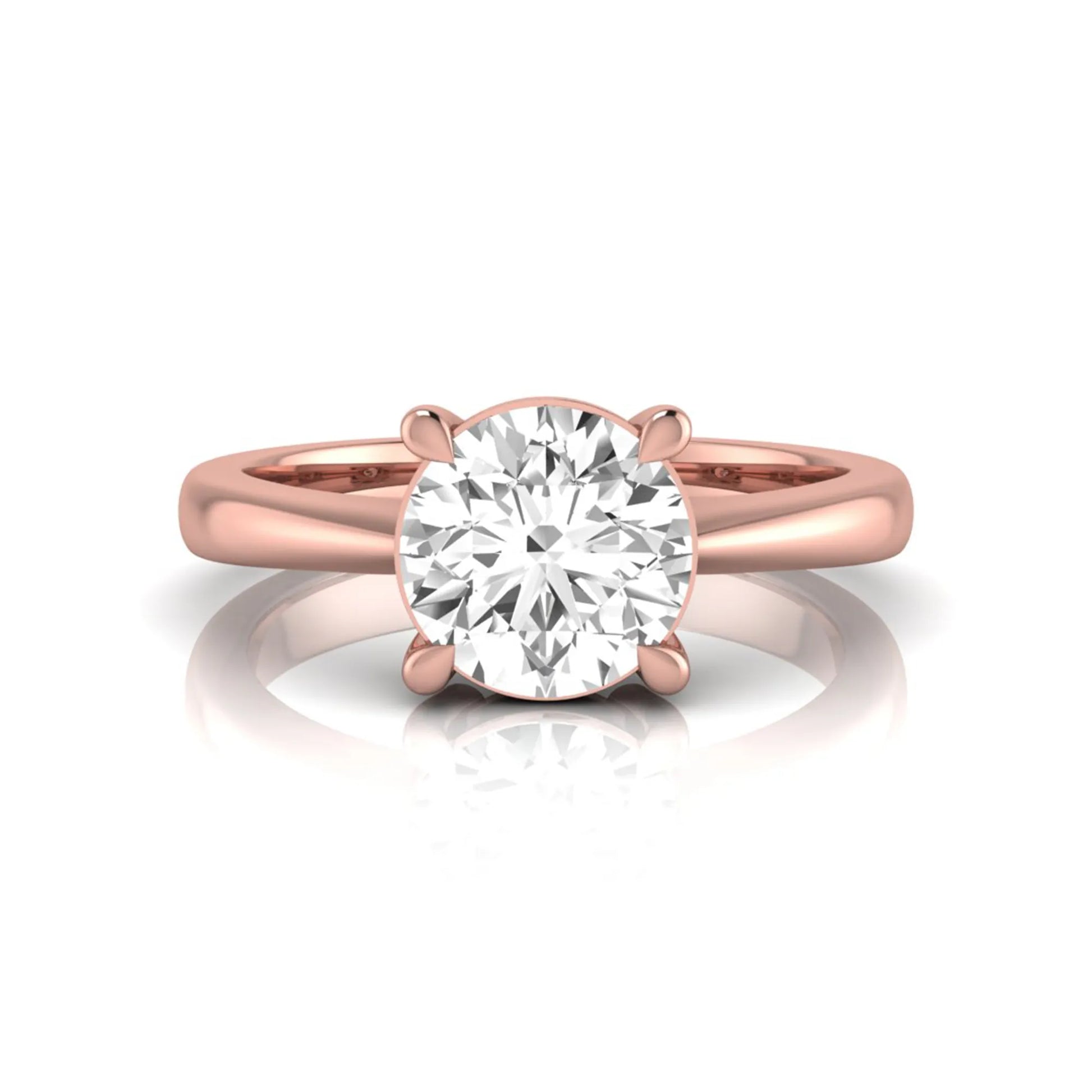 Round cut lab grown diamond solitaire engagement ring in rose gold featuring a 1.28 carat IGI certified diamond.