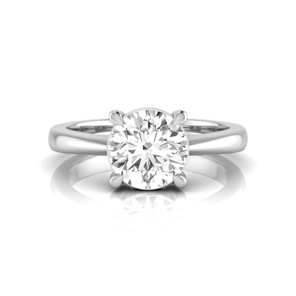 Round cut lab grown diamond solitaire engagement ring in white gold featuring a 1.28 carat IGI certified diamond.