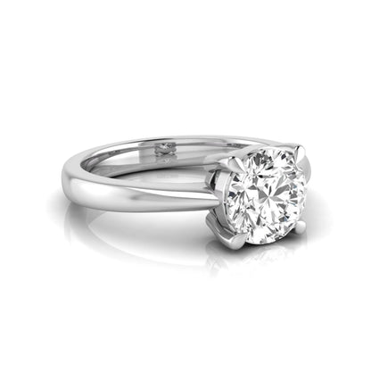 Round cut lab grown diamond solitaire engagement ring in white gold featuring a 1.28 carat IGI certified diamond.