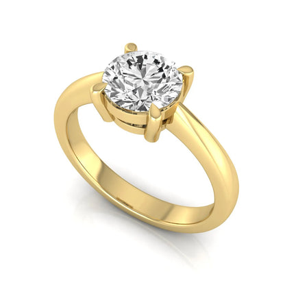 Round cut lab grown diamond solitaire engagement ring in yellow gold featuring a 1.28 carat IGI certified diamond.