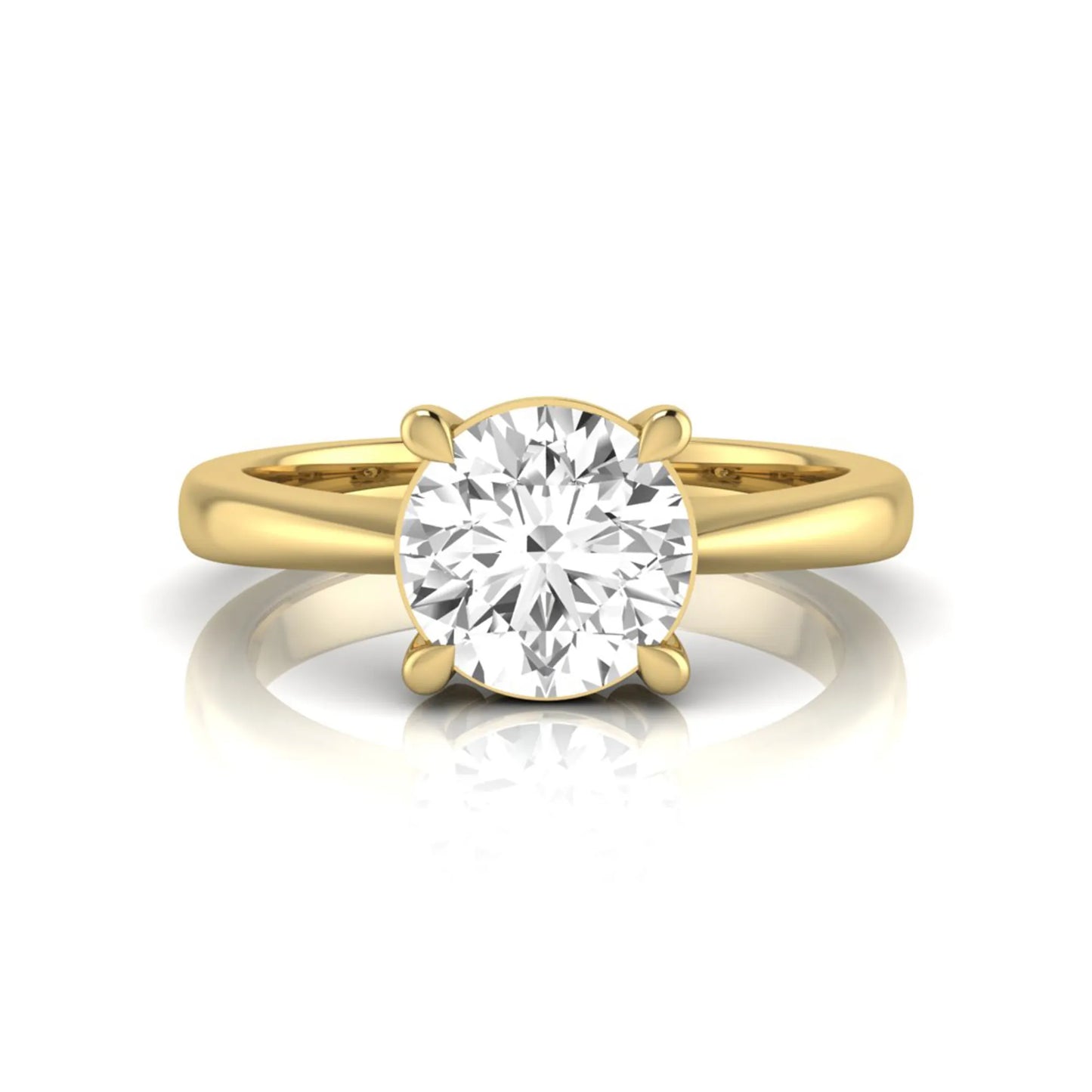 Round cut lab grown diamond solitaire engagement ring in yellow gold featuring a 1.28 carat IGI certified diamond.