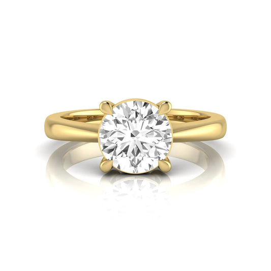 Round cut lab grown diamond solitaire engagement ring in yellow gold featuring a 1.28 carat IGI certified diamond.