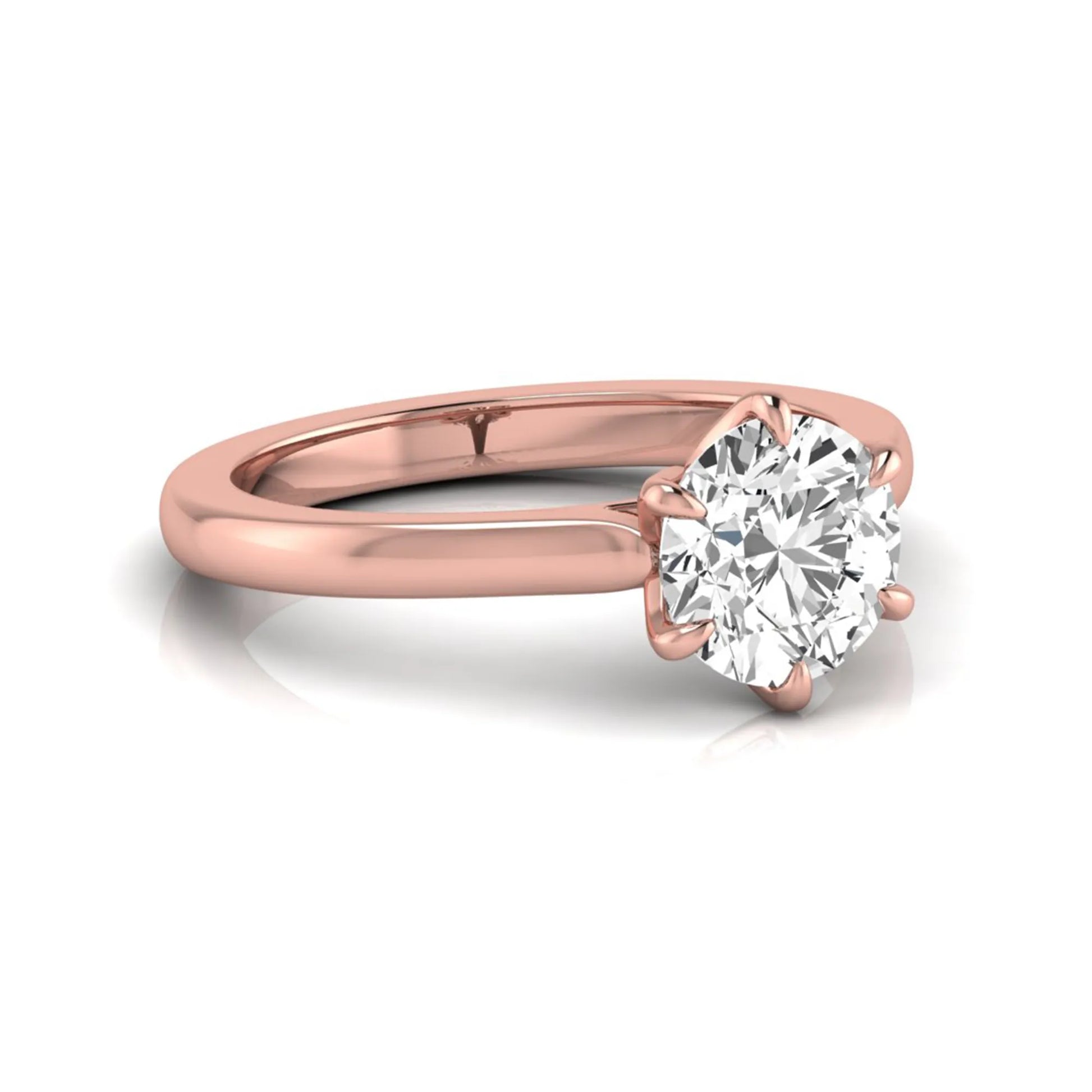 Round cut lab grown diamond solitaire engagement ring featuring a six-prong setting with a polished rose gold tone band.