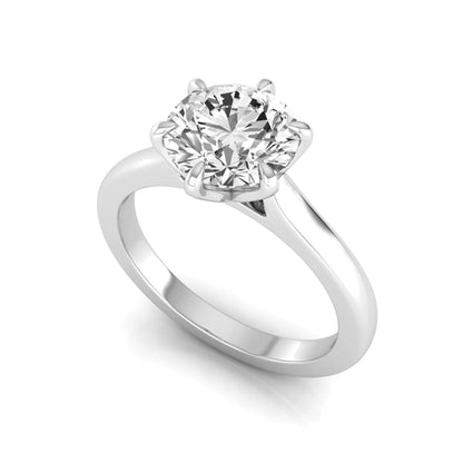 Round cut lab grown diamond solitaire engagement ring featuring a six-prong setting with a polished white gold tone band.