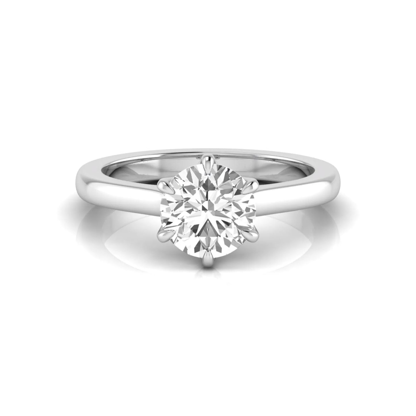 Round cut lab grown diamond solitaire engagement ring featuring a six-prong setting with a polished white gold tone band.