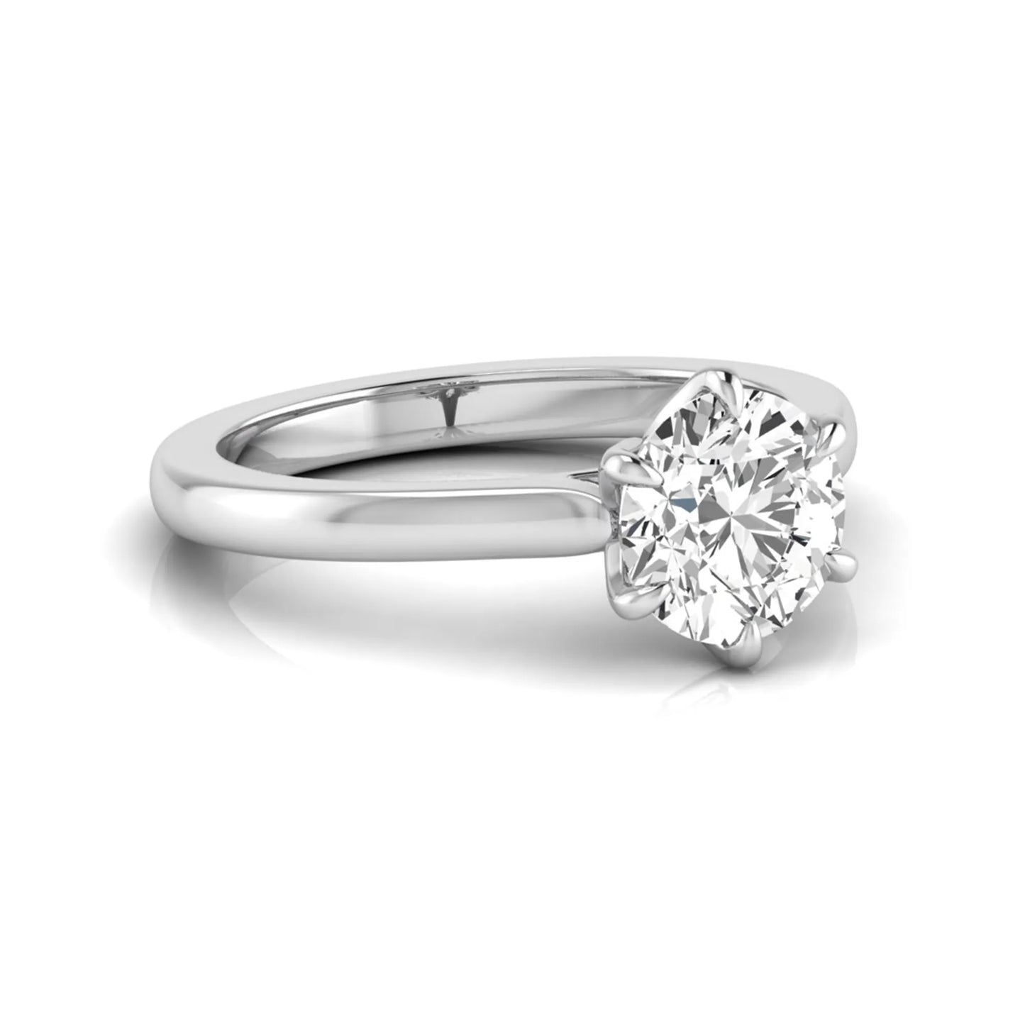 Round cut lab grown diamond solitaire engagement ring featuring a six-prong setting with a polished white gold tone band.