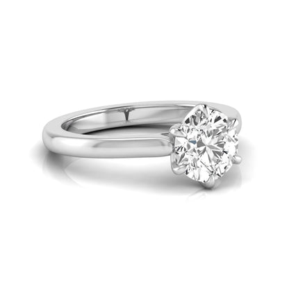 Round cut lab grown diamond solitaire engagement ring featuring a six-prong setting with a polished white gold tone band.