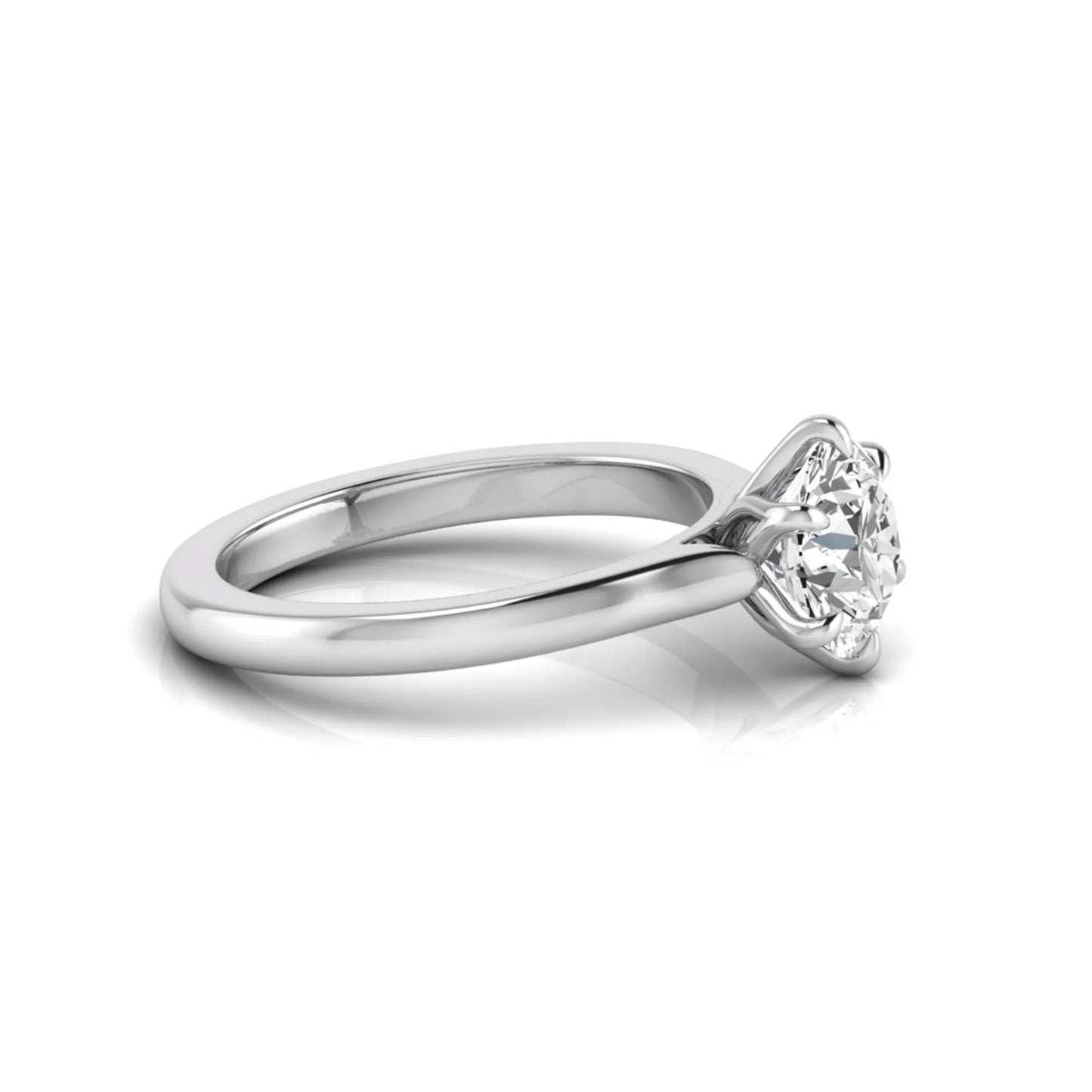 Round cut lab grown diamond solitaire engagement ring featuring a six-prong setting with a polished white gold tone band.