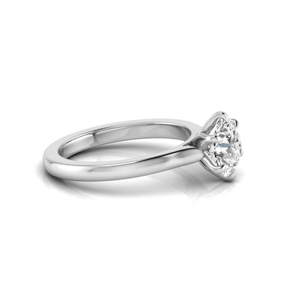 Round cut lab grown diamond solitaire engagement ring featuring a six-prong setting with a polished white gold tone band.