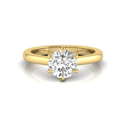 Round cut lab grown diamond solitaire engagement ring featuring a six-prong setting with a polished yellow gold tone band.