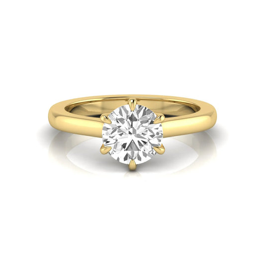 Round cut lab grown diamond solitaire engagement ring featuring a six-prong setting with a polished yellow gold tone band.