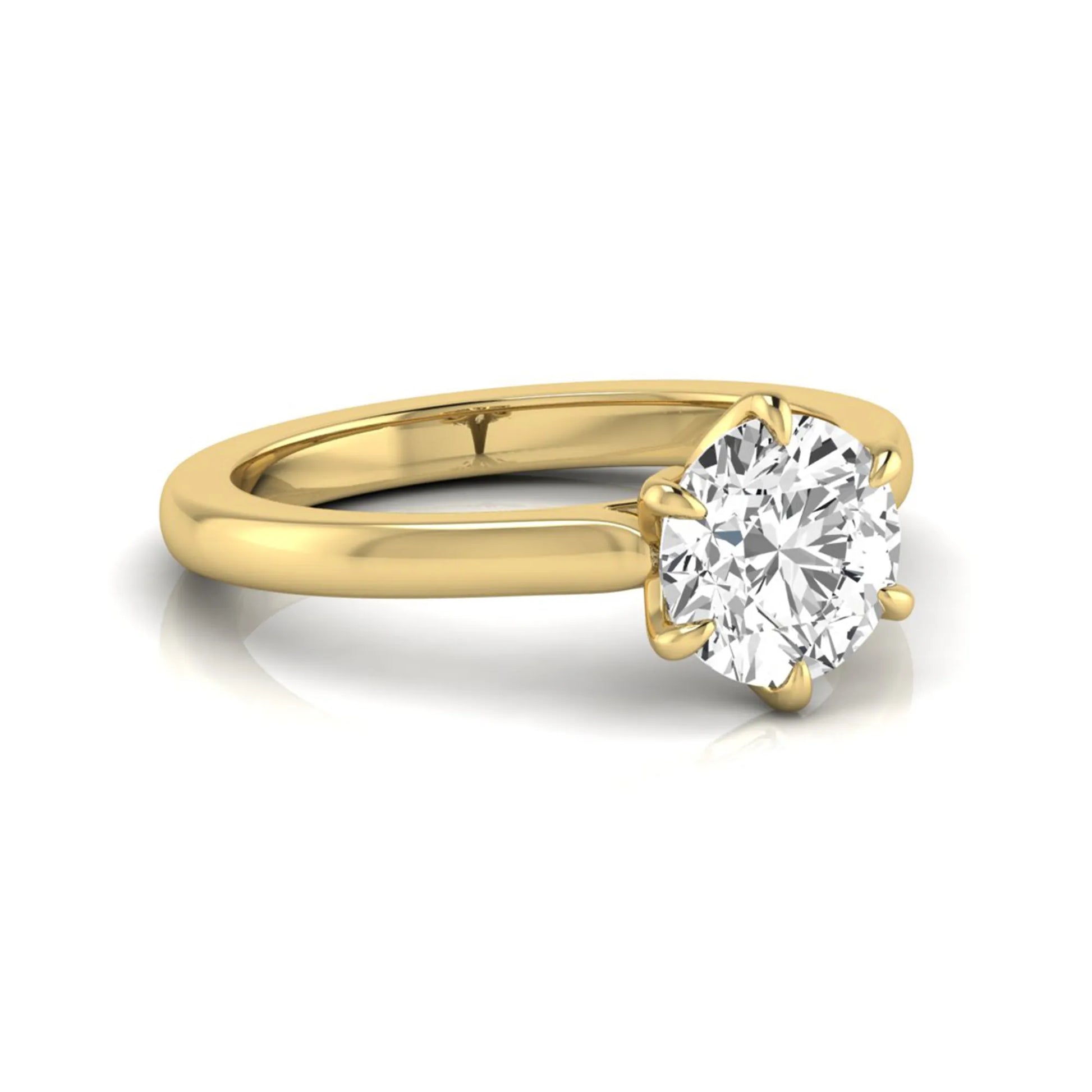 Round cut lab grown diamond solitaire engagement ring featuring a six-prong setting with a polished yellow gold tone band.