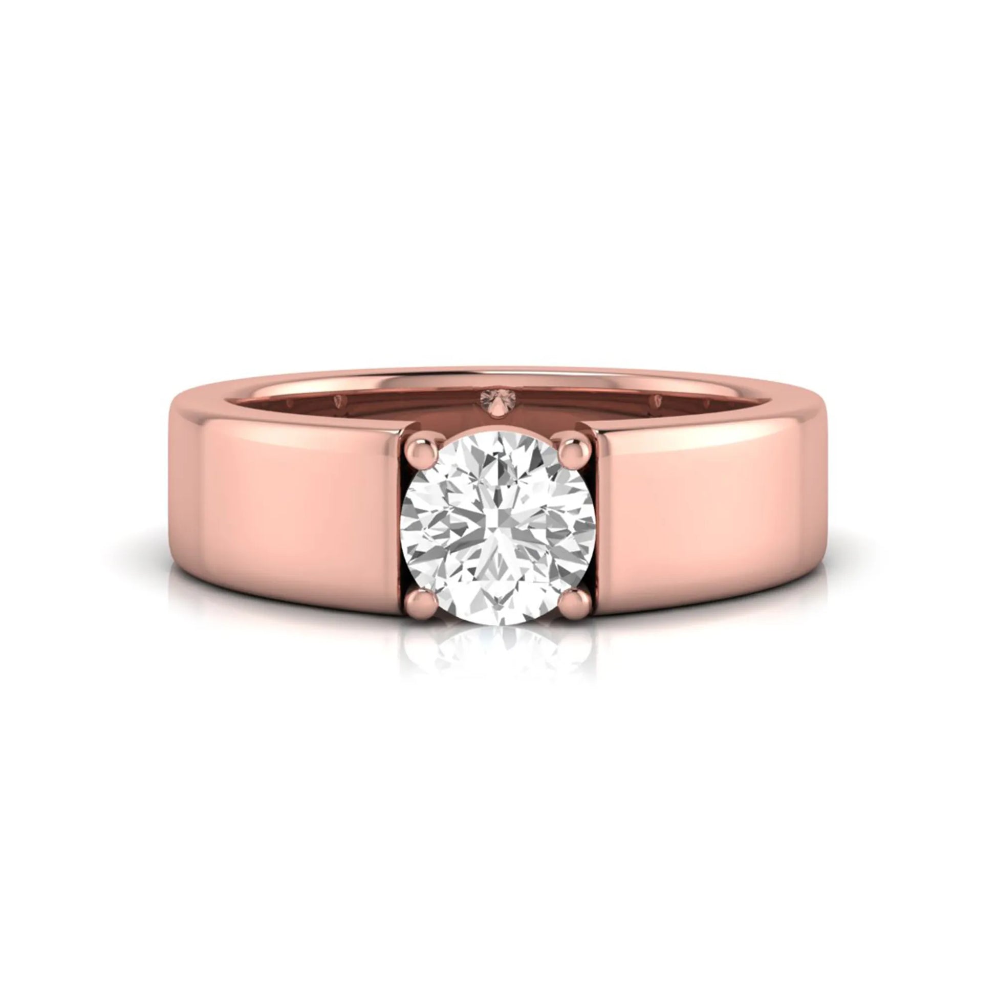 Round cut lab grown diamond solitaire engagement ring featuring a four-prong setting with a wide rose gold tone comfort-fit band.