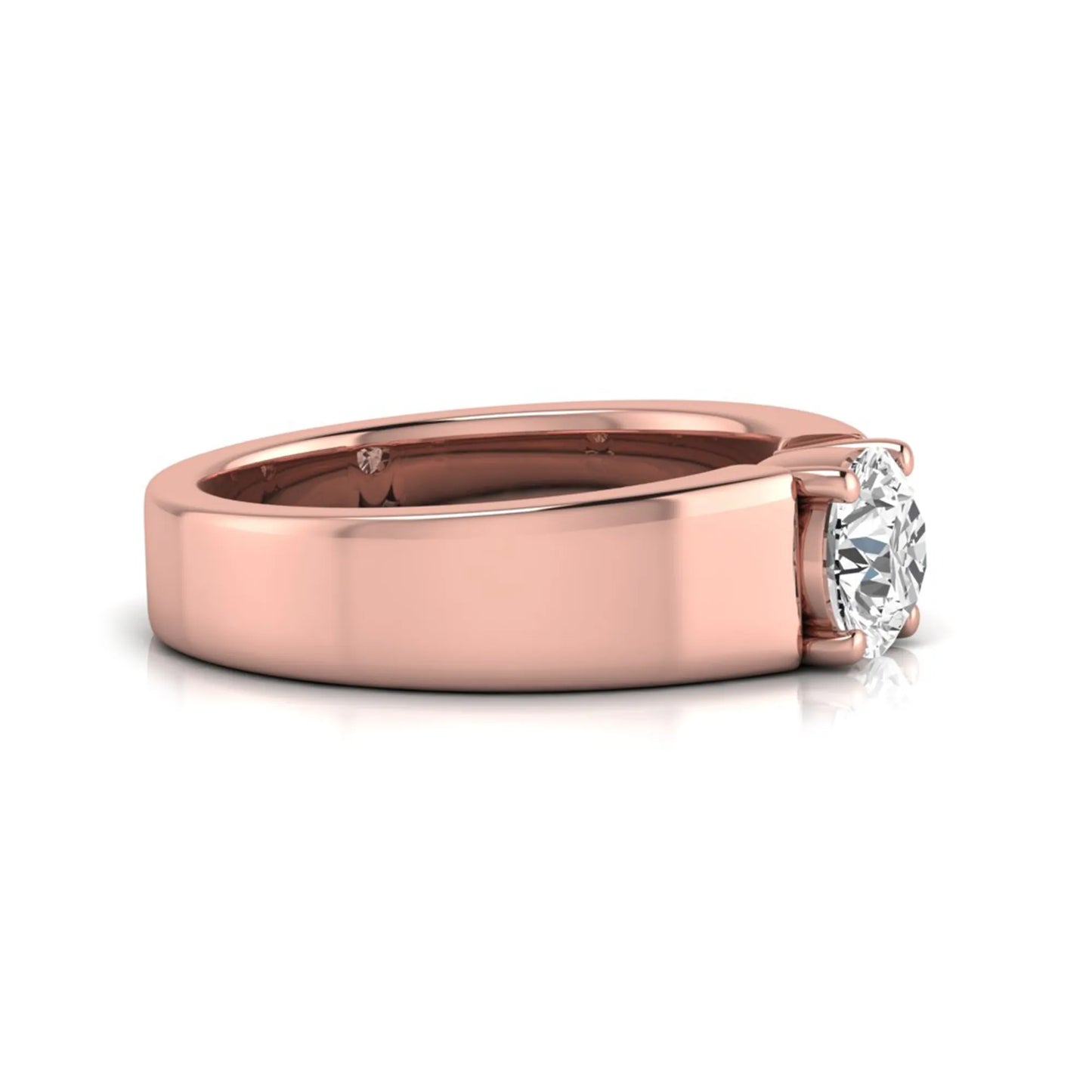 Round cut lab grown diamond solitaire engagement ring featuring a four-prong setting with a wide rose gold tone comfort-fit band.
