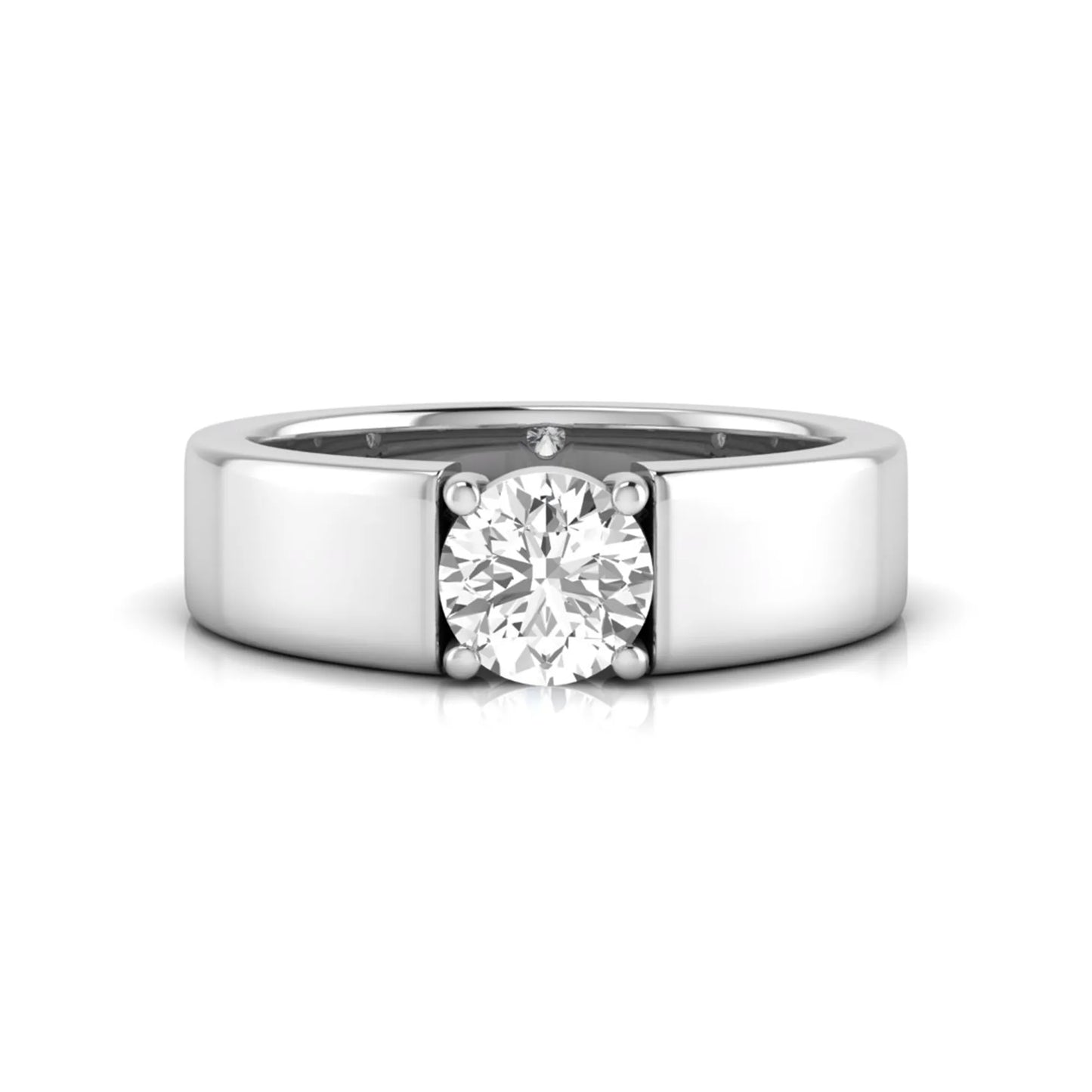 Round cut lab grown diamond solitaire engagement ring featuring a four-prong setting with a wide white gold tone comfort-fit band.