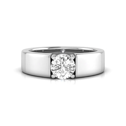 Round cut lab grown diamond solitaire engagement ring featuring a four-prong setting with a wide white gold tone comfort-fit band.