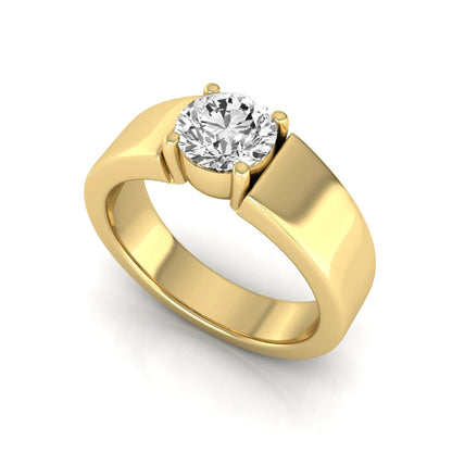 Round cut lab grown diamond solitaire engagement ring featuring a four-prong setting with a wide yellow gold tone comfort-fit band.