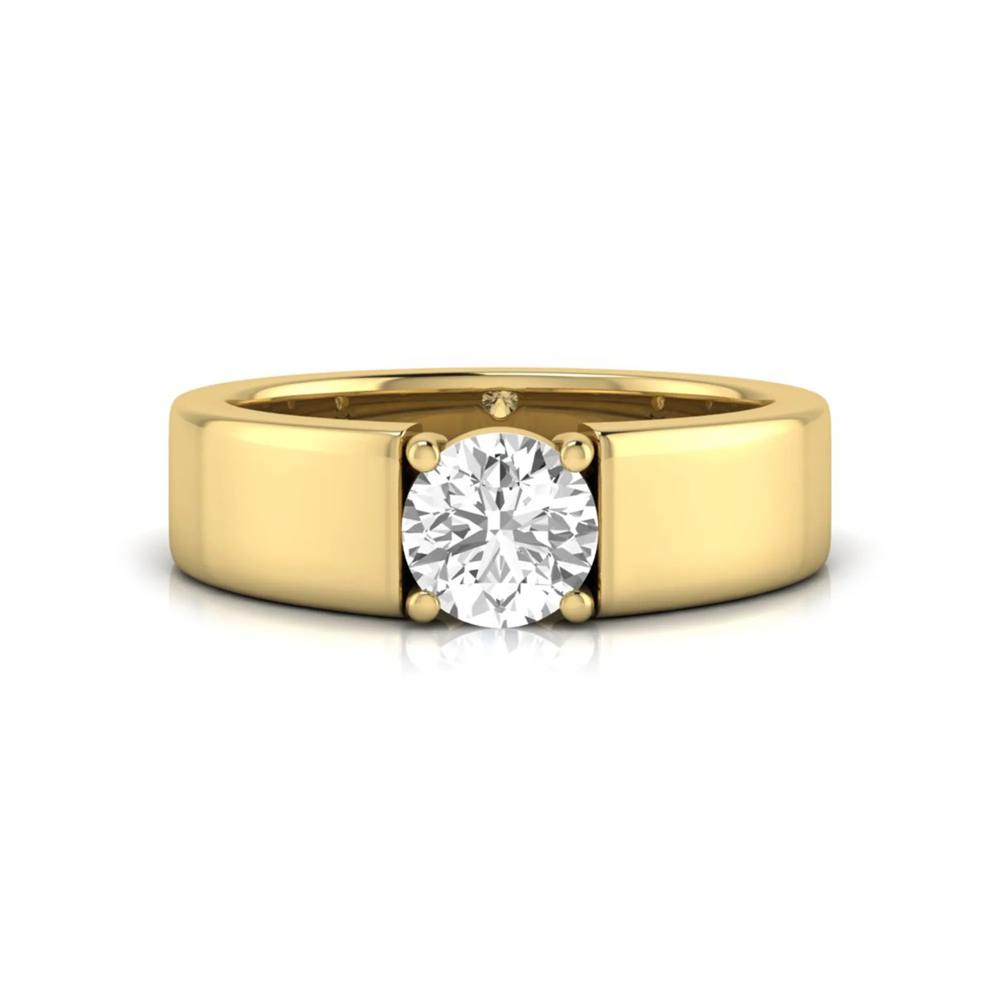 Round cut lab grown diamond solitaire engagement ring featuring a four-prong setting with a wide yellow gold tone comfort-fit band.