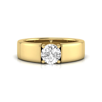 Round cut lab grown diamond solitaire engagement ring featuring a four-prong setting with a wide yellow gold tone comfort-fit band.