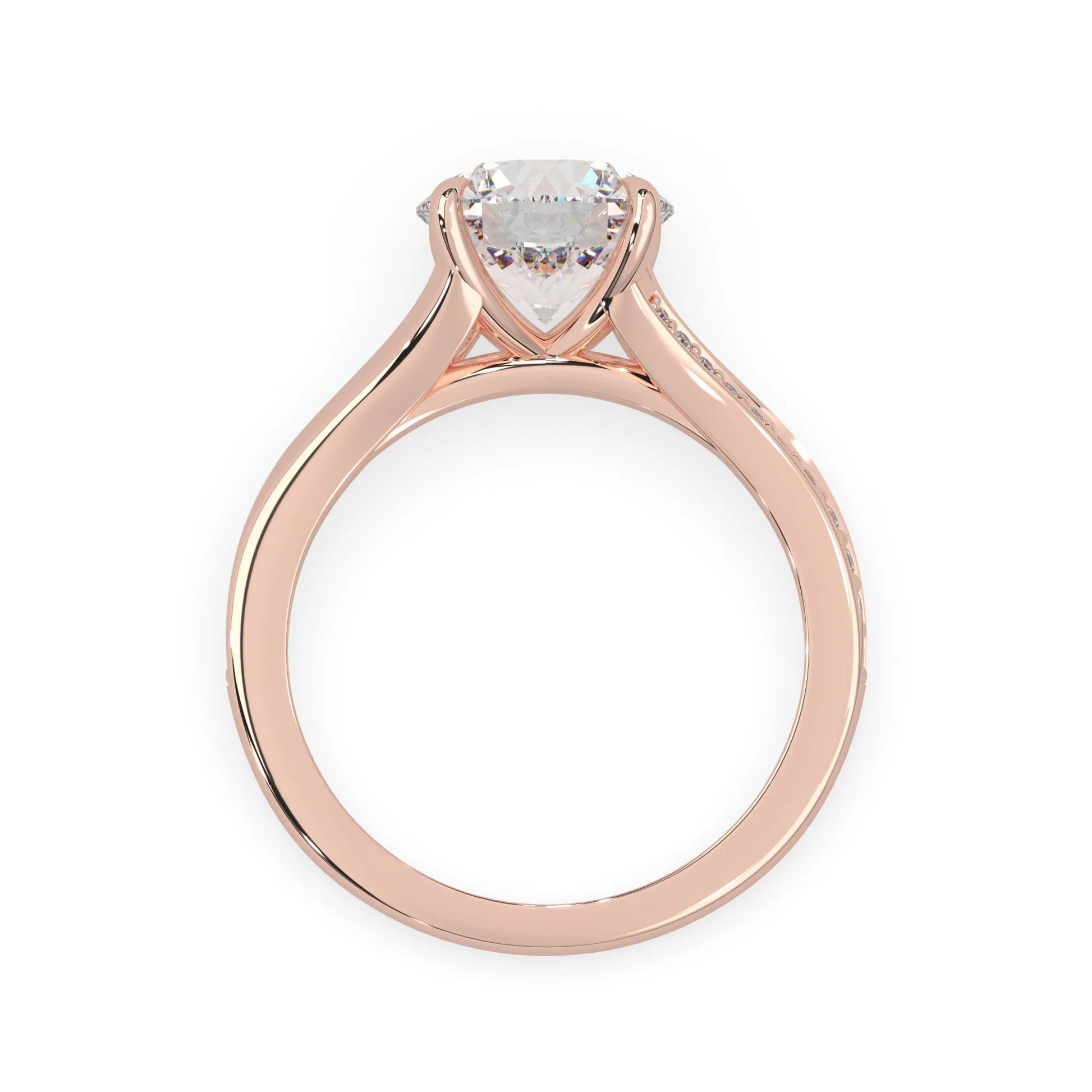 Rose gold ring with a heart-shaped diamond on a white background
