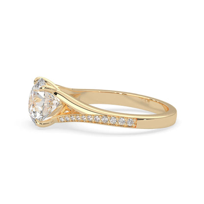 yellow Gold ring with a diamond on a white background