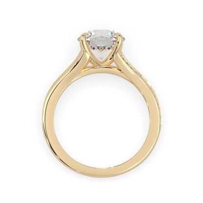 yellow Gold ring with a heart-shaped diamond on a white background