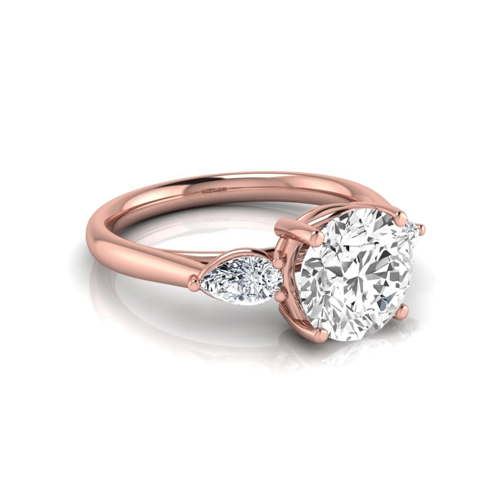 Round cut lab grown diamond three stone engagement ring featuring a 2.04 carat IGI certified center diamond with pear side diamonds in rose gold