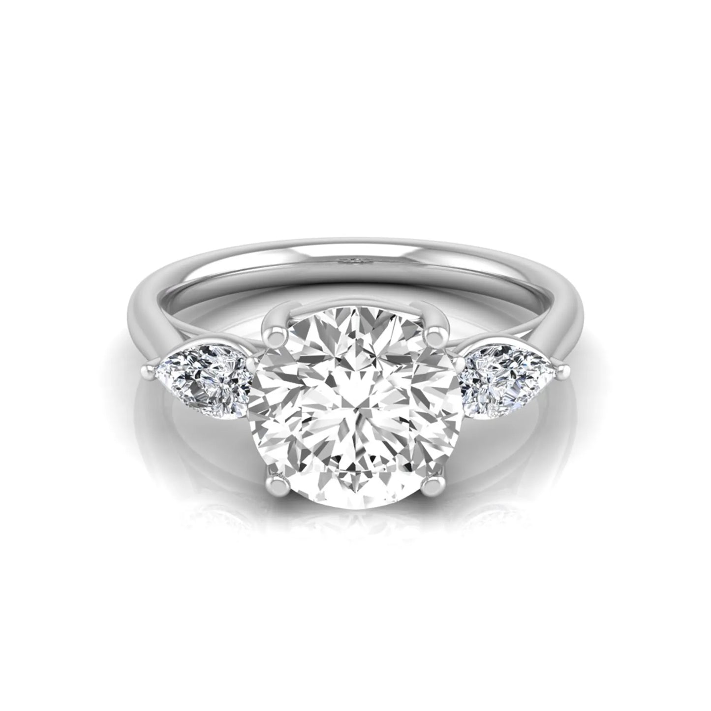 Round cut lab grown diamond three stone engagement ring featuring a 2.04 carat IGI certified center diamond with pear side diamonds in white gold