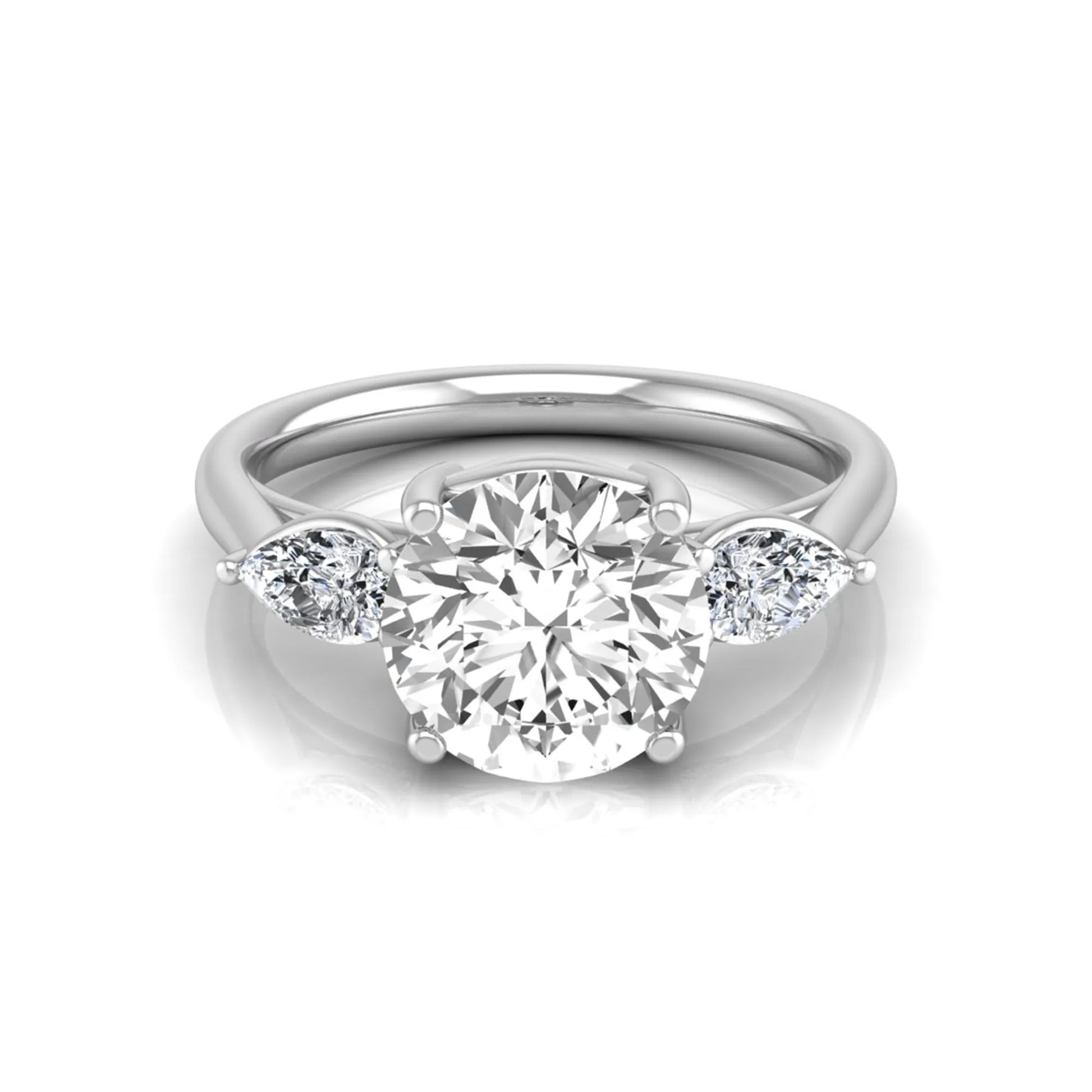 Round cut lab grown diamond three stone engagement ring featuring a 2.04 carat IGI certified center diamond with pear side diamonds in white gold