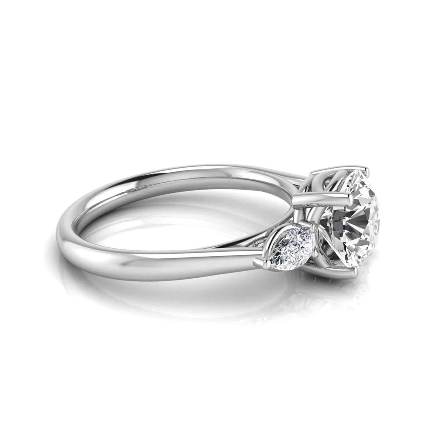 Round cut lab grown diamond three stone engagement ring featuring a 2.04 carat IGI certified center diamond with pear side diamonds in white gold