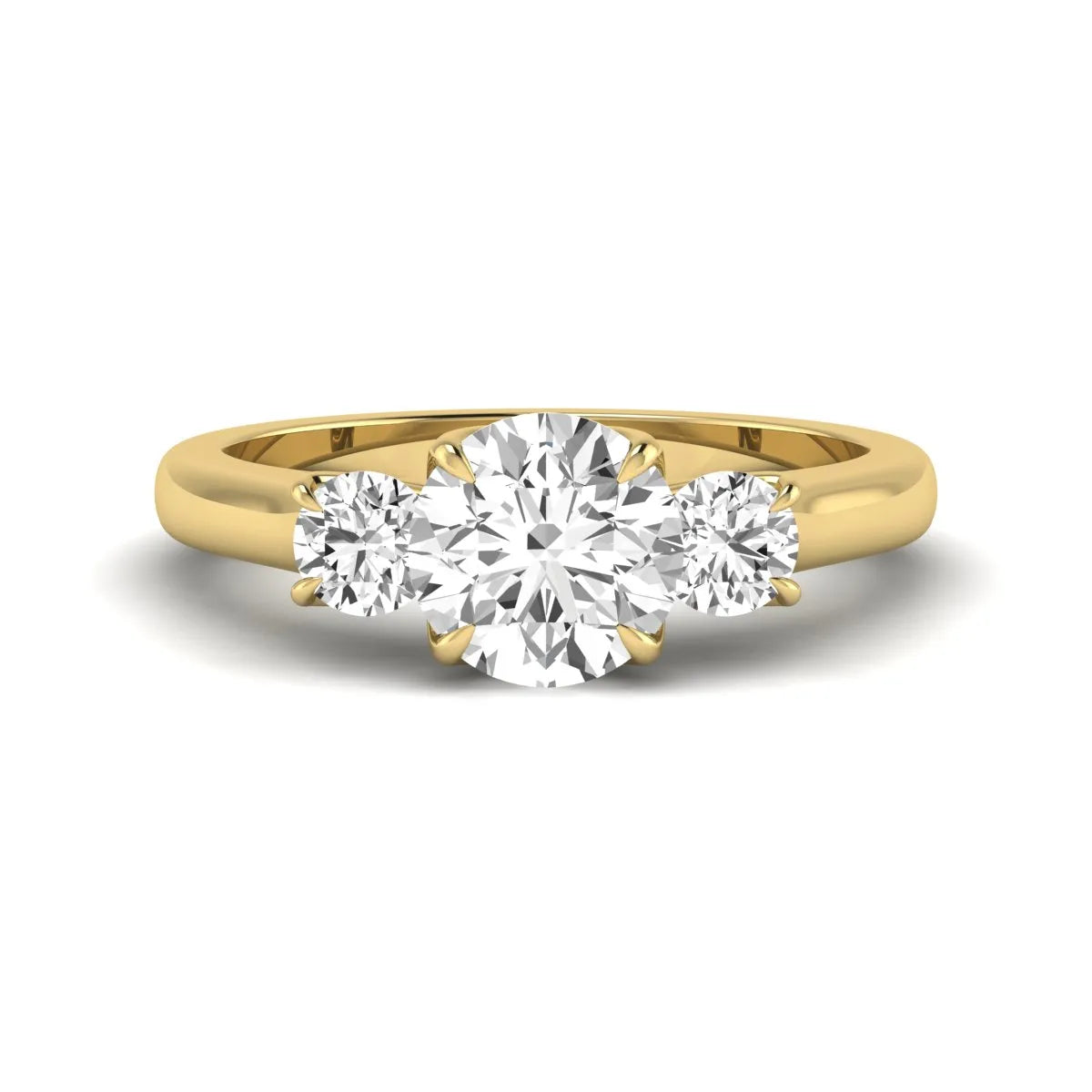 IGI certified round cut lab grown diamond three stone engagement ring with round side diamonds in yellow gold.