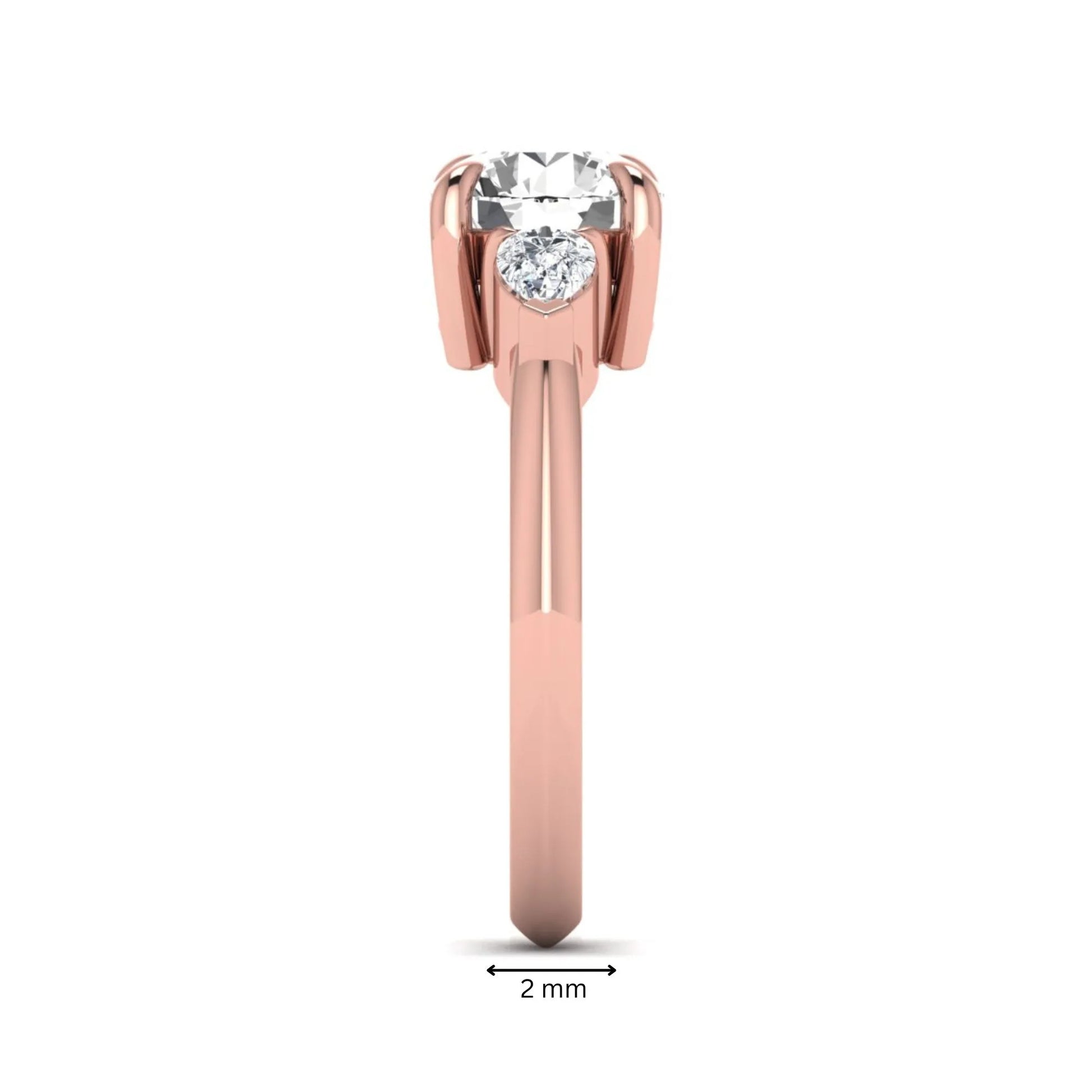 IGI certified round cut lab grown diamond three stone engagement ring with pear side diamonds in rose gold.