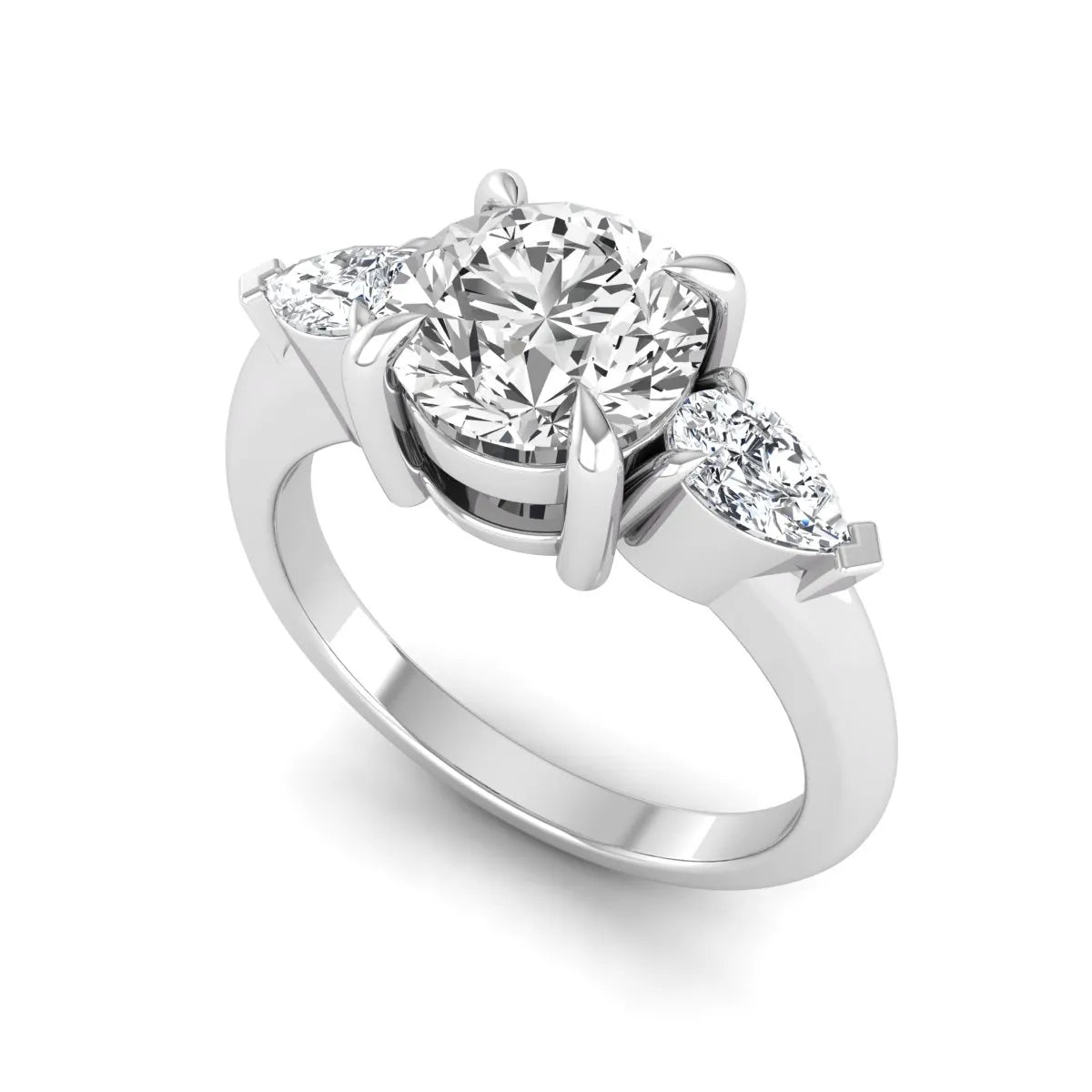 IGI certified round cut lab grown diamond three stone engagement ring with pear side diamonds in white gold.