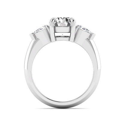 IGI certified round cut lab grown diamond three stone engagement ring with pear side diamonds in white gold.