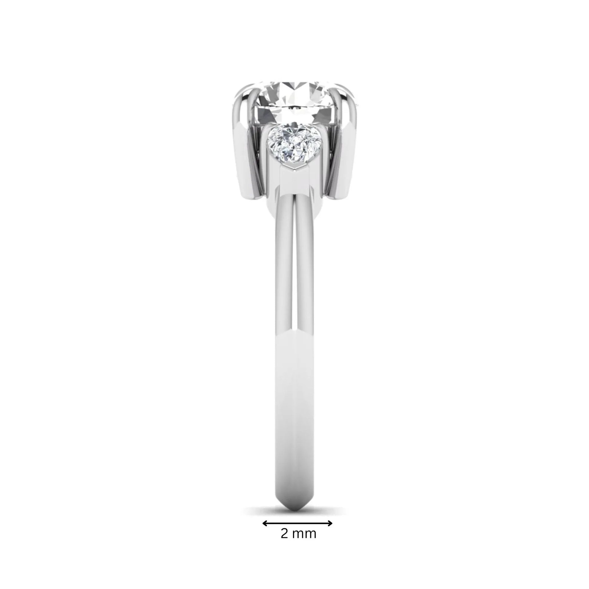 IGI certified round cut lab grown diamond three stone engagement ring with pear side diamonds in white gold.