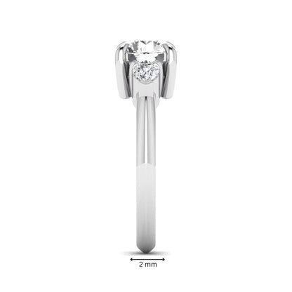 IGI certified round cut lab grown diamond three stone engagement ring with pear side diamonds in white gold.