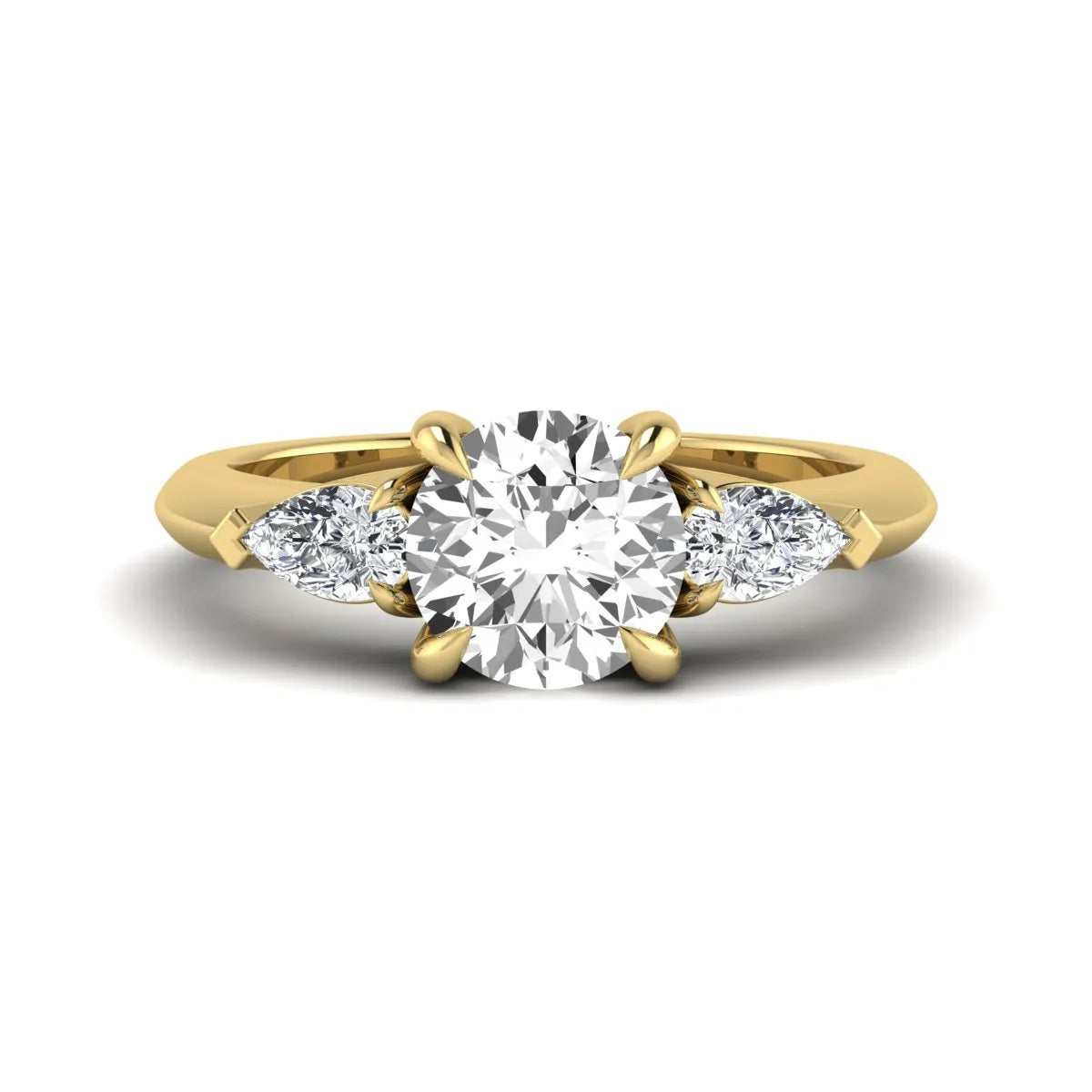 IGI certified round cut lab grown diamond three stone engagement ring with pear side diamonds in yellow gold.