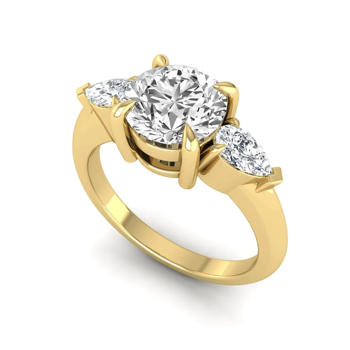 IGI certified round cut lab grown diamond three stone engagement ring with pear side diamonds in yellow gold.