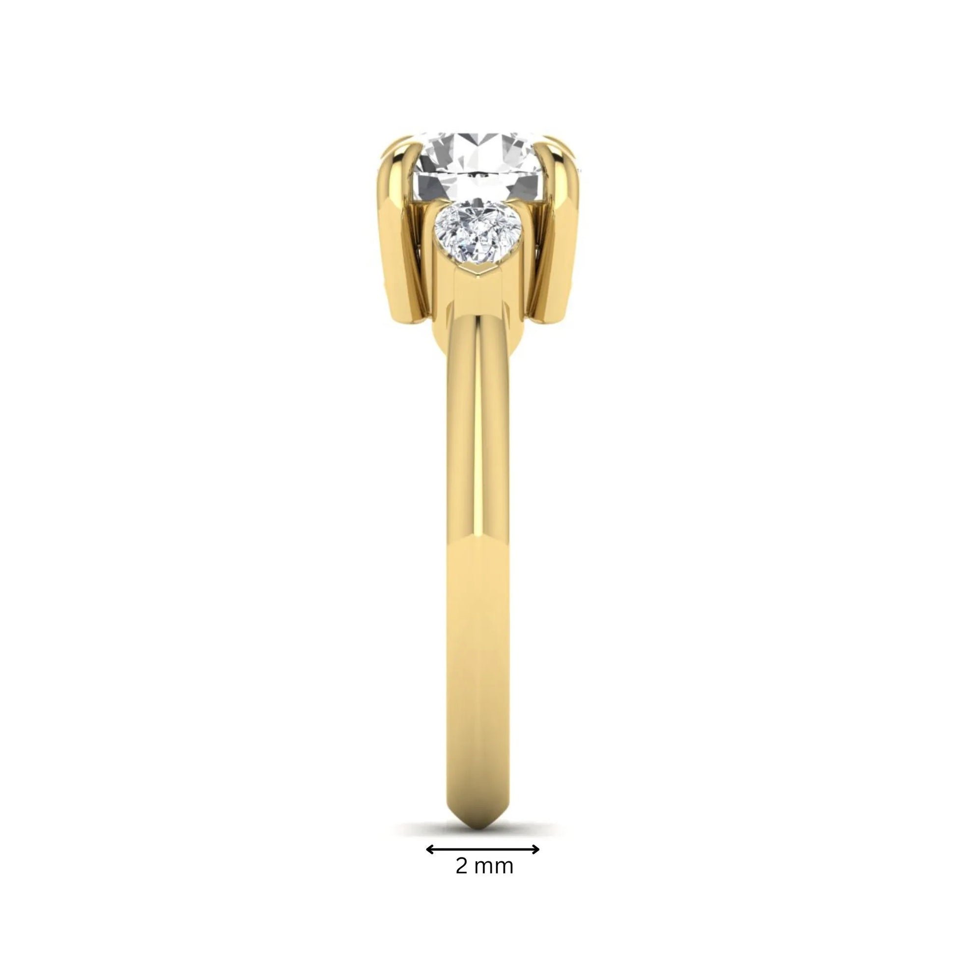 IGI certified round cut lab grown diamond three stone engagement ring with pear side diamonds in yellow gold.