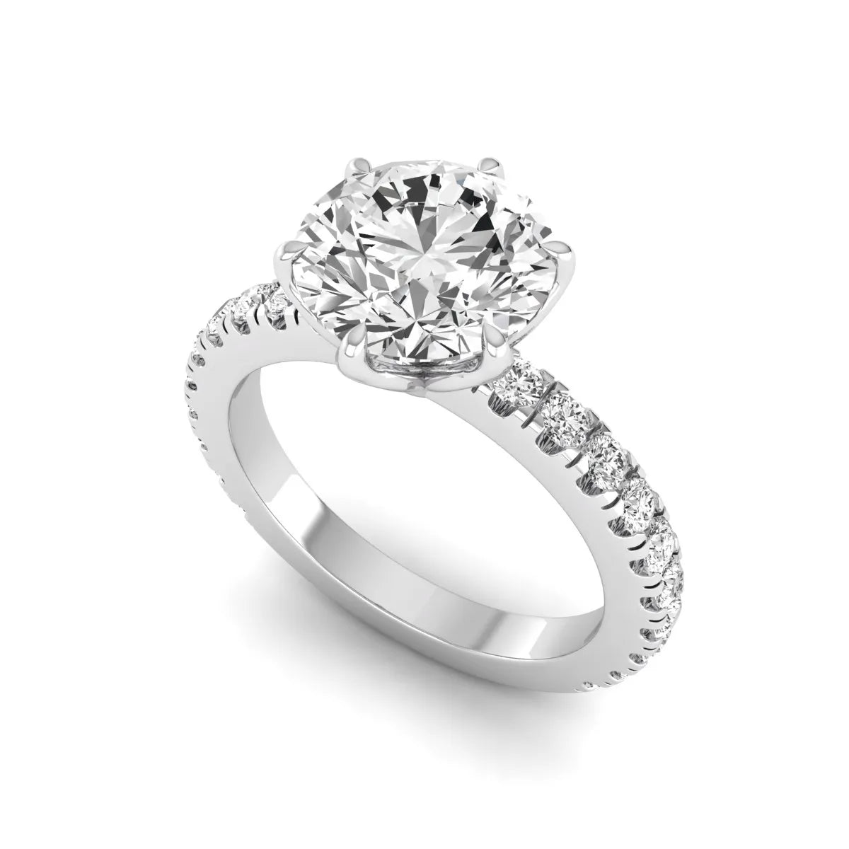 Round cut lab grown diamond pavé solitaire engagement ring with cathedral setting in white gold.