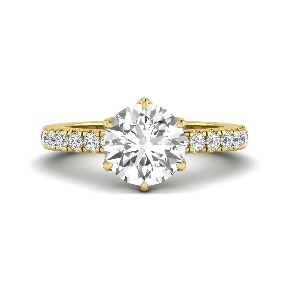 Round cut lab grown diamond pavé solitaire engagement ring with cathedral setting in yellow gold.