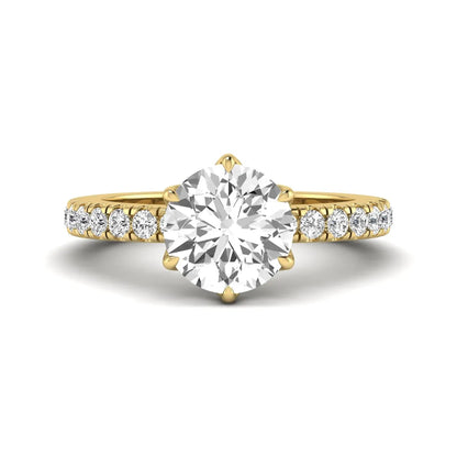 Round cut lab grown diamond pavé solitaire engagement ring with cathedral setting in yellow gold.